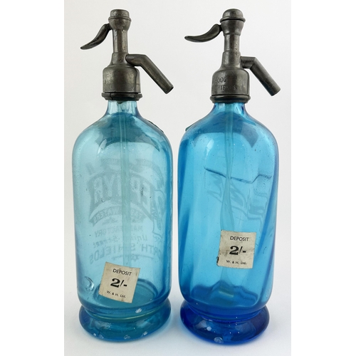 10 - ZEPHYR NORTH SHIELDS SODA SYPHON DUO. 11.8ins tall to top of trigger. Blue glass, footed base. One o... 