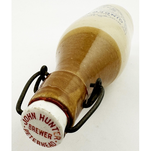 14 - JOHN HUNTER PETERHEAD GINGER BEER BOTTLE. 9.2ins tall, ch., t.t., square swing stopper type lip - or... 