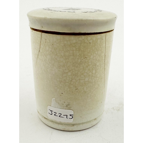 27 - OINTMENT POT. 3ins tall. A most unusual tall off white pot with original plastic printed top DR ROBE... 