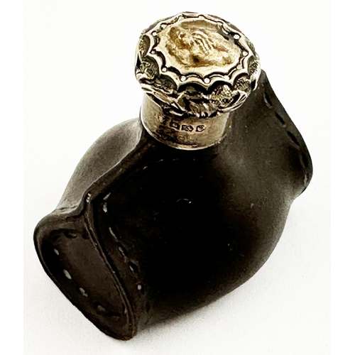 36 - MINIATURE DOULTON LEATHER LOOK SILVER TOPPED PERFUME. 1.9ins tall, matt black, stoneware, silver mar... 