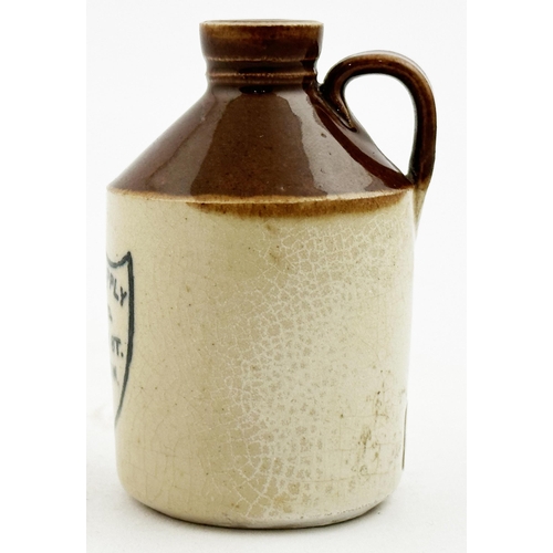 38 - MINIATURE DAIRY SUPPLY CO FLAGON. 2.7ins tall, t.t. (dark brown top), rear handle, cork closure, fro... 