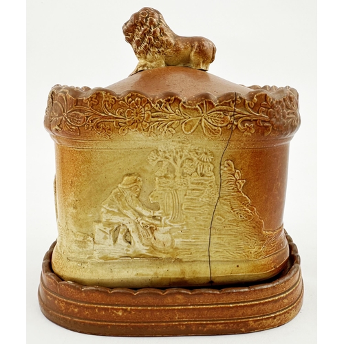 101 - BRAMPTON DATED TOBACCO JAR. 5.5ins tall. Square body, lion atop lid, separate base/ stand. Very vari... 