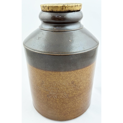 102 - TADDY & CO LONDON SNUFF JAR. 9.5ins tall. T.t. (dark brown top, lower mid, variating, brown) shop di... 