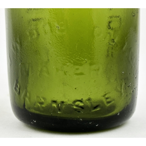 158 - PHILLIPS STAMFORD CODD BOTTLE. 9ins tall, dark green glass, standard two lugs. Heavily embossed vert... 