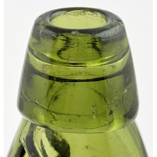 158 - PHILLIPS STAMFORD CODD BOTTLE. 9ins tall, dark green glass, standard two lugs. Heavily embossed vert... 