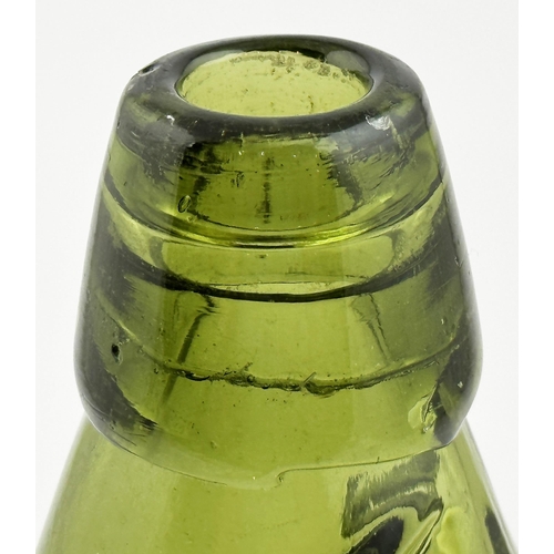 158 - PHILLIPS STAMFORD CODD BOTTLE. 9ins tall, dark green glass, standard two lugs. Heavily embossed vert... 