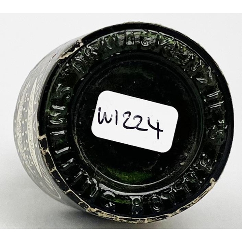 319 - DR MACKENZIES SMELLING BOTTLE. 4ins tall. Dark green glass, paper label, stopper & contents. Label d... 