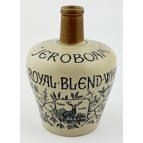 613 - JEROBOAM WHISKY JUG. 7.5ins tall. All over body transfer, rear handle. Base p.m. Lip nibbles. The El... 