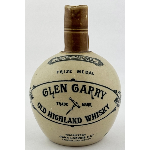 614 - GLEN GARRY WHISKY JUG. 8ins tall. Front transfer. Rear handle. Base p.m. Body discolouration shot ma... 