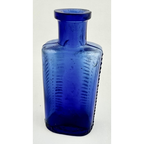 25 - FOULSTONS CRESCENT POISON BOTTLE. 3.6ins. So called due to its crescent shaped cross section. Deligh... 