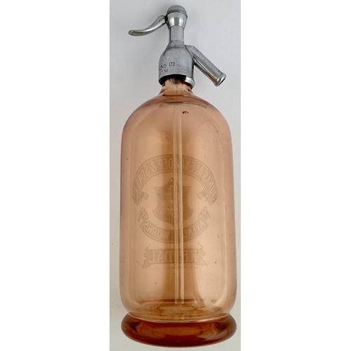 34 - KENDAL SODA SYPHON. 13.6ins tall. Pink glass, footed base type. Shiny metal trigger guard - good. Ac... 