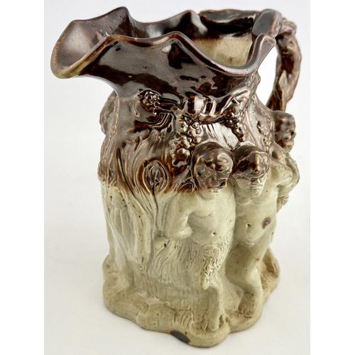 50 - LONDON MADE SATYR JUG. 8.6ins tall. Large t.t. salt glaze handled jug. Absolutely magnificently mode... 