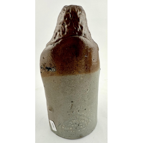 52 - BROUGHAM REFORM FLASK. 7ins tall. T.t., salt glaze figural reform flask Lord Brougham, scroll in han... 