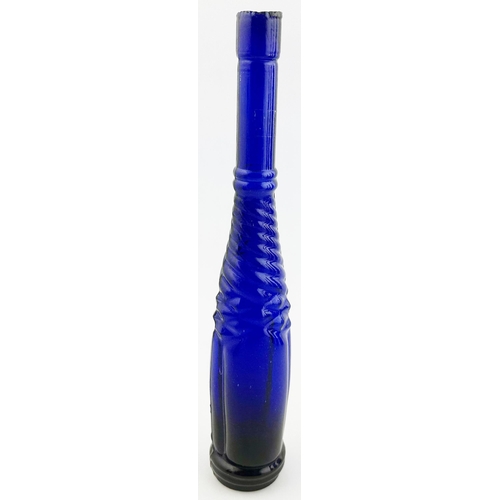 63 - WHIRLEY SALAD OIL BOTTLE. 9.7ins tall, sheared lip, cobalt blue glass. Heavy embossing, elegant tall... 