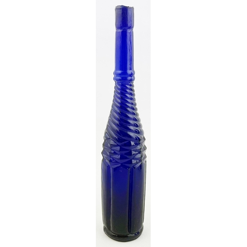 64 - WHIRLEY SALAD OIL BOTTLE. 10.7ins tall, sheared lip, strong, & heavy, cobalt blue glass. Heavy embos... 