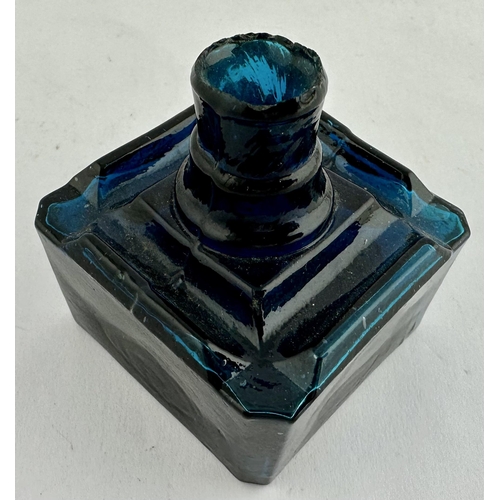 82 - TURQUIOSE SQUARE INK BOTTLE. 2.1 ins tall, 1.75ins squarebase. four nib like inserts around top, she... 