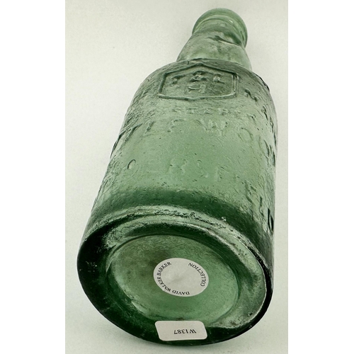 115 - FLAT BASED GREEN MARBLE HUDDERSFIELD CODD BOTTLE. 8.8ins tall. An exceptional offering in the form o... 