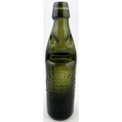 124 - MORRELLS TRUSTEES LION BREWERY OXFORD CODD BOTTLE. 9.2ins tall. A fabulous deep/ dark green glass 10... 