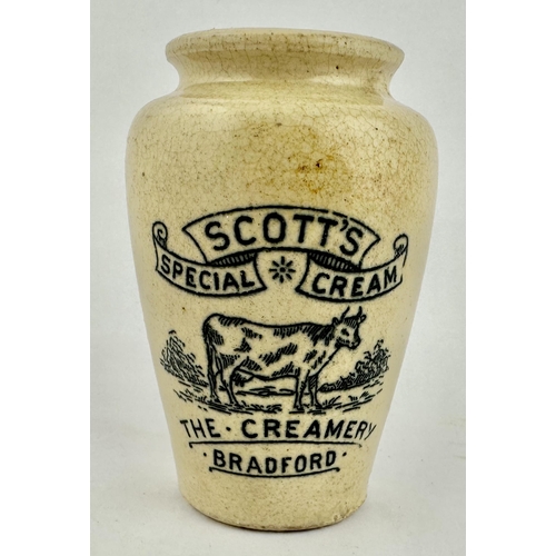 129 - BRADFORD SCOTTS 129. CREAMERY CREAM POT. 3.8ins tall. Off white body, black transfer SCOTT�S/ SPECIA... 