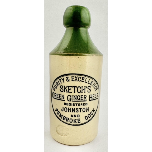 151 - SKETCHS PEMBROKE DOCK GINGER BEER BOTTLE. 6.9ins tall. Std, t.t. (green top, cork closure) Minute in... 