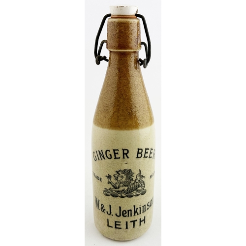 158 - W & J JENKINSON LEITH GINGER BEER BOTTLE. 9.2ins tall. Ch., t.t. (speckled dark tan top glaze), swin... 