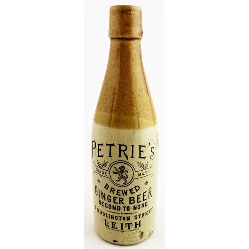 159 - PETRIES LEITH GINGER BEER BOTTLE. 8.9ins tall. Ch., t.t., swing stopper side lugs. Strong, crisp orn... 