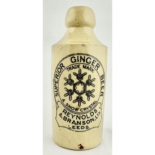 162 - REYNOLDS & BRANSON LEEDS GINGER BEER BOTTLE. 6.5ins tall. Std, off white, cork lip. A very strong & ... 