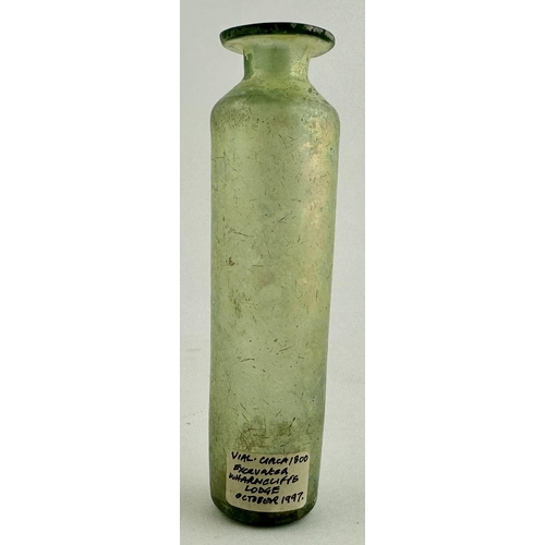 212 - FREEBLOWN APOTHECARY PHIAL. 3.6ins tall. Tall thin cylinder, short neck, flared lip. Overall iridesc... 