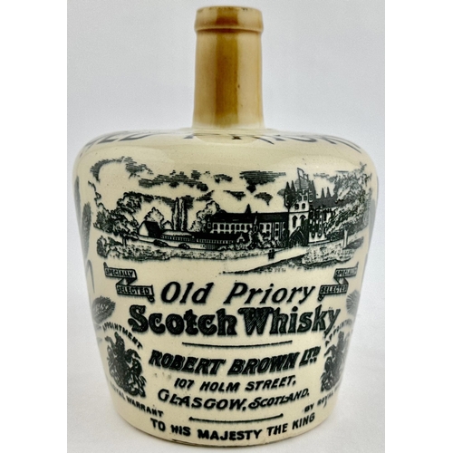 215 - OLD PRIORY SCOTCH WHISKY JUG. (WG p33) 7.3ins tall. Off white with light tan neck & handle. An extre... 