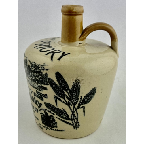 215 - OLD PRIORY SCOTCH WHISKY JUG. (WG p33) 7.3ins tall. Off white with light tan neck & handle. An extre... 