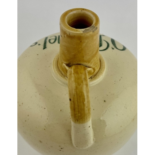 218 - ODONNELS BELFAST OLD IRISH WHISKY JUG. WG p144. 7.6ins tall. Off white body light tan neck & handle.... 