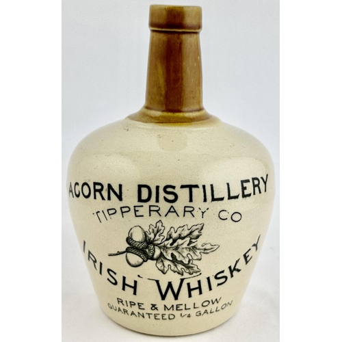 221 - ACORN DISTILLERY IRISH WHISKY JUG. WG p11. 7.7ins tall. Off white body, tan neck & rear handle. Supe... 