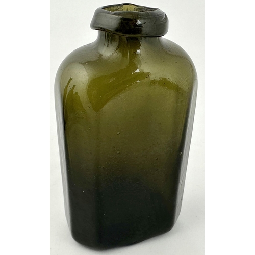 235 - ENGLISH FREEBLOWN BLACK GLASS SNUFF BOTTLE. 5.7ins tall, rectangular base with facetted corners. A q... 