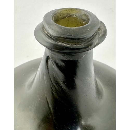 240 - ENGLISH BLACK GLASS ONION WINE BOTTLE. 5.1ins tall. Dense black glass classic c. 1705-1710 onion bot... 