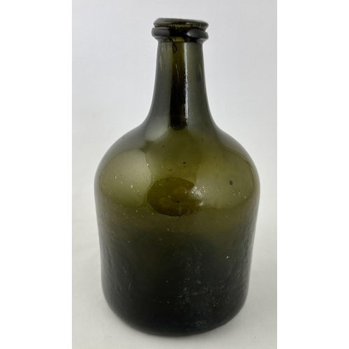 243 - ENGLISH BLACK GLASS MALLET WINE BOTTLE. 7.6ins tall. Black/ dark green English mallet. Re annealed l... 