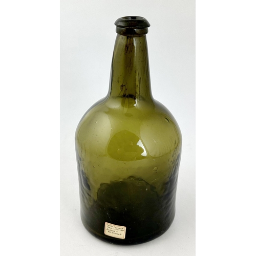 244 - ENGLISH BLACK GLASS MALLET WINE BOTTLE. 8.7ins tall. Dark green glass, wonderful large air bubbles e... 