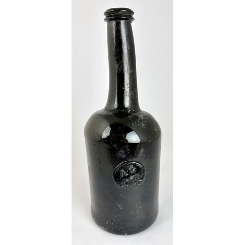 252 - ALL SOULS COMMON ROOM SEALED WINE BOTTLE. 10.3ins tall, heavy freeblown black glass, long neck (wonk... 