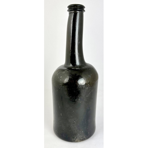 252 - ALL SOULS COMMON ROOM SEALED WINE BOTTLE. 10.3ins tall, heavy freeblown black glass, long neck (wonk... 