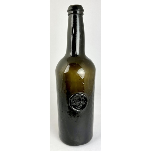 253 - LINCOLN COLLEGE SEALED WINE BOTTLE. 11.5ins tall. Afine three part black glass wine/ very dark green... 