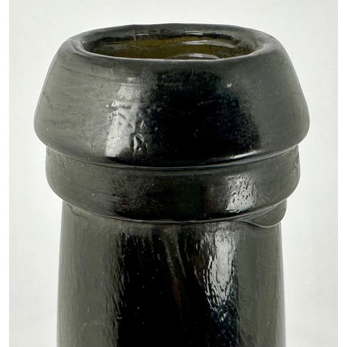 253 - LINCOLN COLLEGE SEALED WINE BOTTLE. 11.5ins tall. Afine three part black glass wine/ very dark green... 