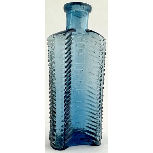 193 - FOULSTONS CRESCENT POISON BOTTLE. DP57. 4.8ins tall. Crescent shape cross section. Delightful deep c... 