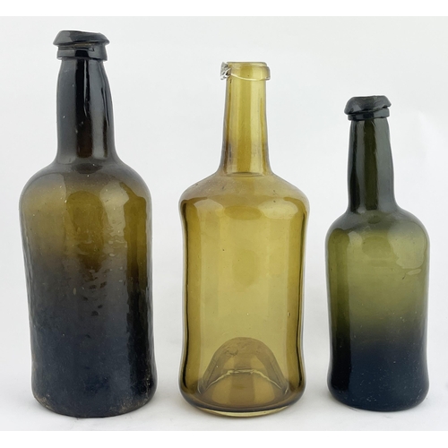 307 - WINE BOTTLE TRIO. Tallest 10ins. Various coloured green glass, base pontil. Slight damage. (3)