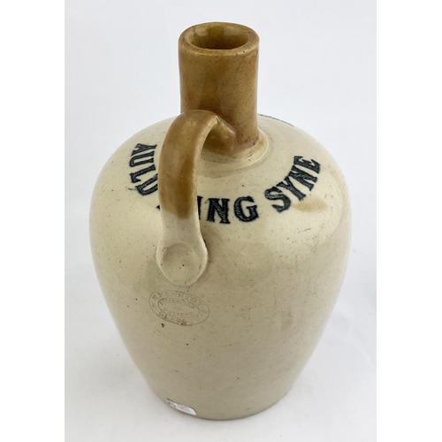 415 - AULD LANG SYNE WHISKY JUG. 8ins tall. Black print to front, rear handle & p.m., lettering to shoulde... 