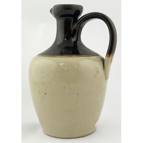 478 - WATSONS DUNDEE WHISKY JUG. 8.5ins tall. Black transfer, pictorial to front, rear handle, base p. m. ... 