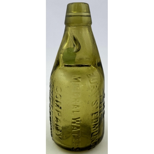 233 - BURY ST EDMUNDS AMBER DUMPY CODD BOTTLE. 7.2ins tall. Light amber glass, 5 vertical lines embossed a... 