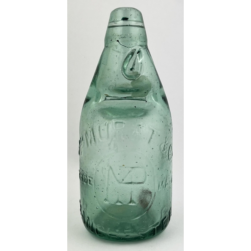 676 - MANCHESTER DUMPY CODD BOTTLE. 7.25ins tall. Embossed PH MURAT & CO. Base chips.