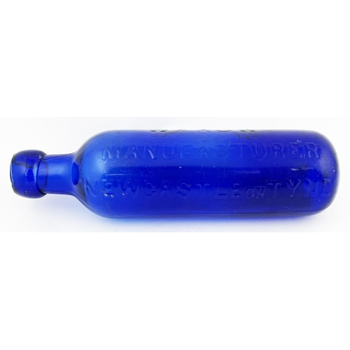 677 - ROUND BOTTOMED CYLINDER BOTTLE. 8.5ins tall. Cobalt blue glass, embossed WM ROW/MANUFACTURER/ NEWCAS... 