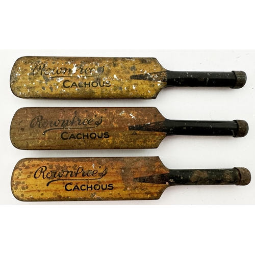 122 - ROWNTREES CRICKET BAT CACHOUS TINS TRIO. 4.4ins long. Shaped cricket bats realistically coloured, sm... 