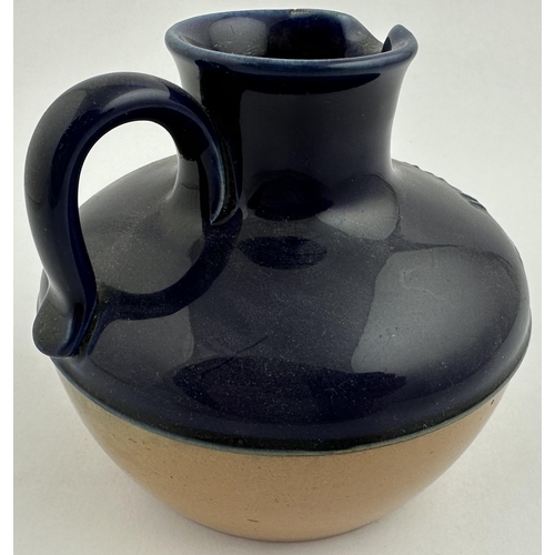 37 - USHERS SCOTCH WHISKY PUB JUG. 4.8ins tall. Very unusual squat stoneware shape, top deep blue, lower ... 