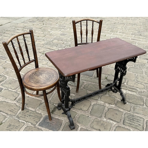 45 - PUB TABLE & TWO CHAIRS. Another original rectangular pub table, ornate heavy cast base. Replaced woo... 